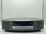 a close up of a television sitting on top of a white table