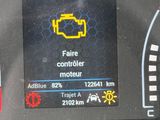 a picture of a car dashboard with a digital display