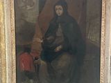 un vieux tableau représentant une femme et un enfant assis sur un banc