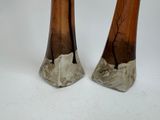 two vases that have been decorated with trees on them
