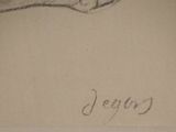 drawing of a cat laying down with the word jesus written on it