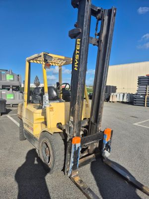 a forklift that is parked in a parking lot
