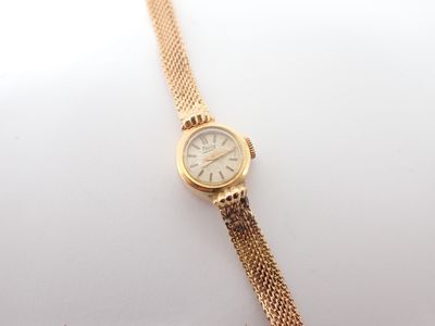 THISI montre de dame, boitier et bracelet or, poids 11,7gr (accidents  - Photo 1