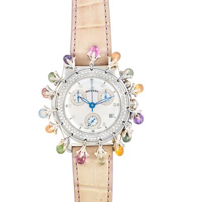 une image représentant une montre-bracelet pour femme ornée de pierres multicolores