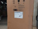 a large cardboard box sitting on top of a pallet in a garage