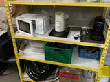 a yellow shelf that has many different items on it