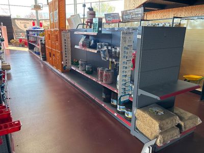 a shelf that has some items on it in a store
