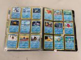 a lot of pokemon cards on the table