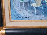 a picture of a painting of a table and chairs