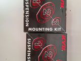 two boxes of mounting kits are sitting on a white surface