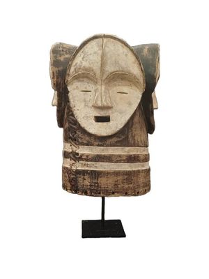 Casque NGontang à décor de quatre visages adossés, e…