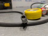 a close up of a hose and a hose on a table
