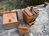 a small wooden box and a small wooden box on top of a rock