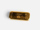 a gold bar on a white background
