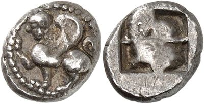 a close up of a silver coin with an image of a man on it