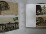 an open book with pictures of old buildings on it