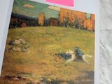 a picture of a dog laying in a field with a post - it note attached to it
