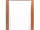 an empty wooden frame on a white background with a shadow