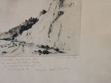 a black and white drawing of a cliff on the beach
