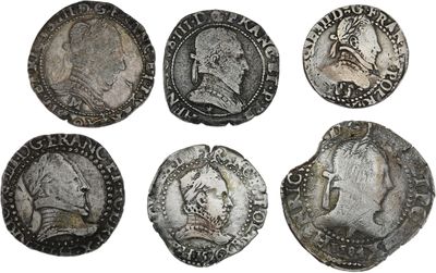six pièces de monnaie romaines antiques, dont l'une représente un buste et l'autre est un buste