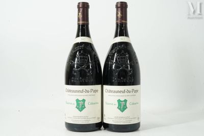 two bottles of wine sitting next to each other on a white surface