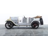 a old car that is parked in a garage