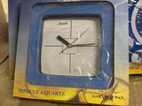 a box with a clock inside of it sitting on a table