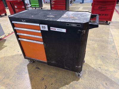 an image of a black and orange tool cabinet