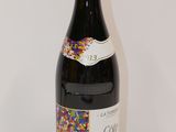 a bottle of wine that has sprinkles on it