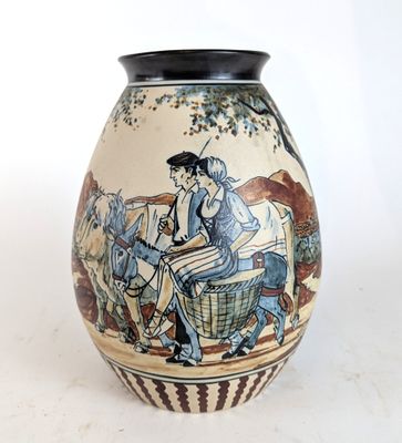 a vase that has a picture of a man on a horse drawn carriage