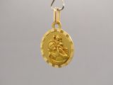 an image of a gold coin with a jesus on it