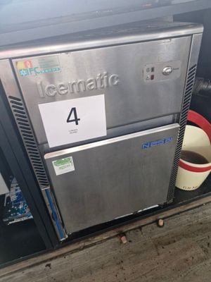 a refrigerator that is sitting on the side of the street