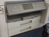 a printer that is sitting on top of a desk