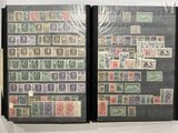 many different stamps on the pages of a book