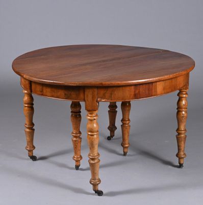 une image représentant une table en bois sur roulettes, sur fond gris
