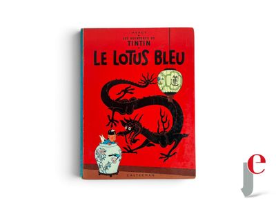 a red book with a black dragon on it