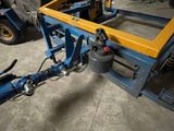 an image of a trailer being worked on in a garage