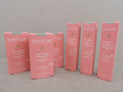 four boxes of sanofore skin care products sitting on a table