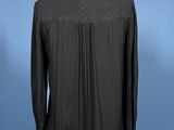 a black shirt on a mannequin mannequin mannequin mannequin mannequin mannequin mannequin mannequin mannequin