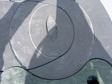 a metal object with holes in the middle of it