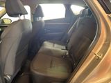 the back seats of a car are empty and the passenger seat is empty