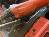 many tools in a red case on the floor