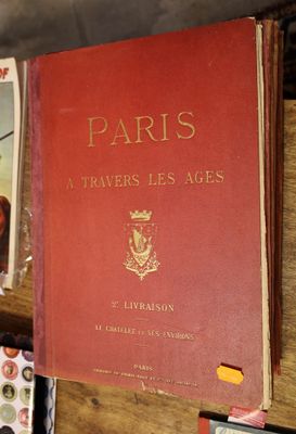 many books on a shelf in a store