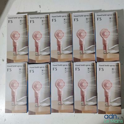 six boxes of hairbrushes sitting on top of a table