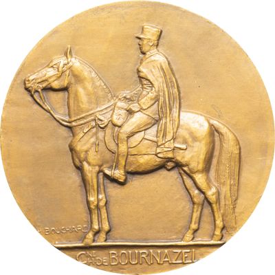 une image représentant une médaille de bronze sur laquelle figure un homme à cheval