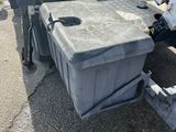 an image of a dump truck that has been left on the street