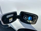 an electric car plugged into a charging station