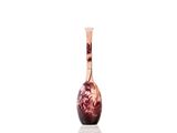 a vase that is sitting on a table with a white background