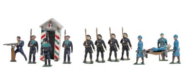 a lot of figurines that are standing in a line