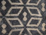 an image of a close up of a black and white beaded cloth